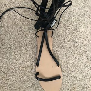 Tall gladiator sandals